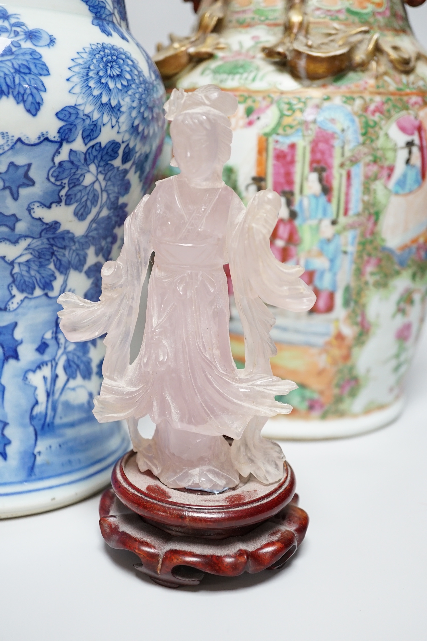 A pair of Chinese Canton decorated famille rose enamelled vases, 36cm high, an early 20th century Chinese blue and white baluster vase, 25cm (a.f.), a 19th century Chinese blue and white gu shaped vase, 37.5cm (a.f.), a